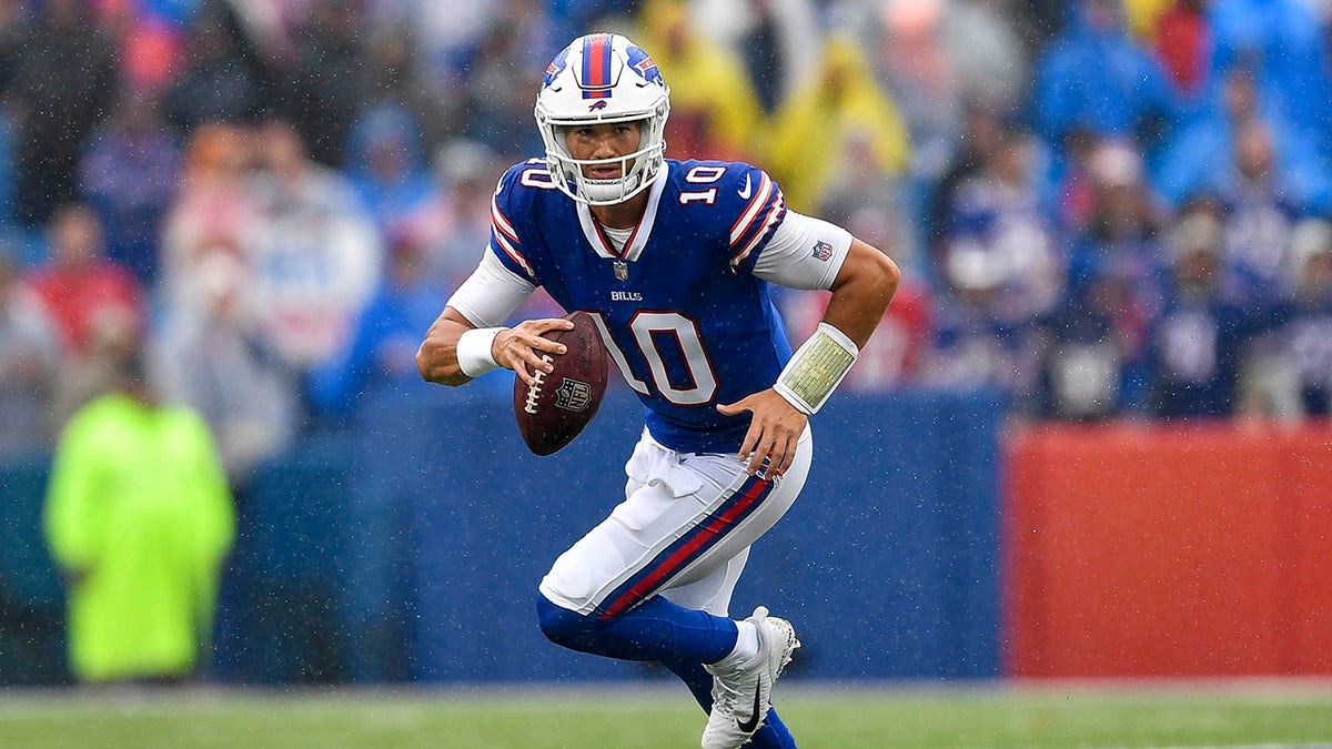 FILE - Buffalo Bills quarterback Mitchell Trubisky runs with the ball during the second half of an NFL football game against the Houston Texans, Sunday, Oct. 3, 2021, in Orchard Park, N.Y. A person with knowledge of the deal tells The Associated Press the Pittsburgh Steelers have agreed to terms on a two-year contract that will give Trubisky a chance to compete for the starting quarterback job following Roethlisberger's retirement in January. The person spoke to the AP on the condition of anonymity because the deal was not yet official. Financial details were not disclosed.