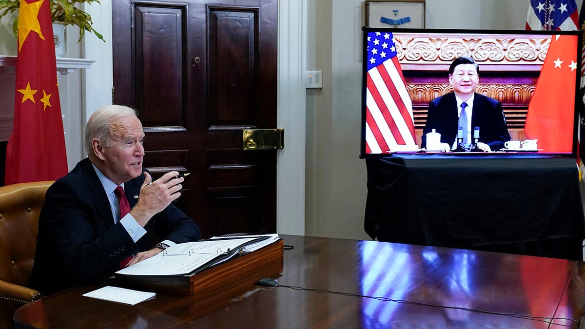 President Biden meets virtually with Chinese President Xi Jinping from the Roosevelt Room of the White House in Washington, on Nov. 15, 2021.