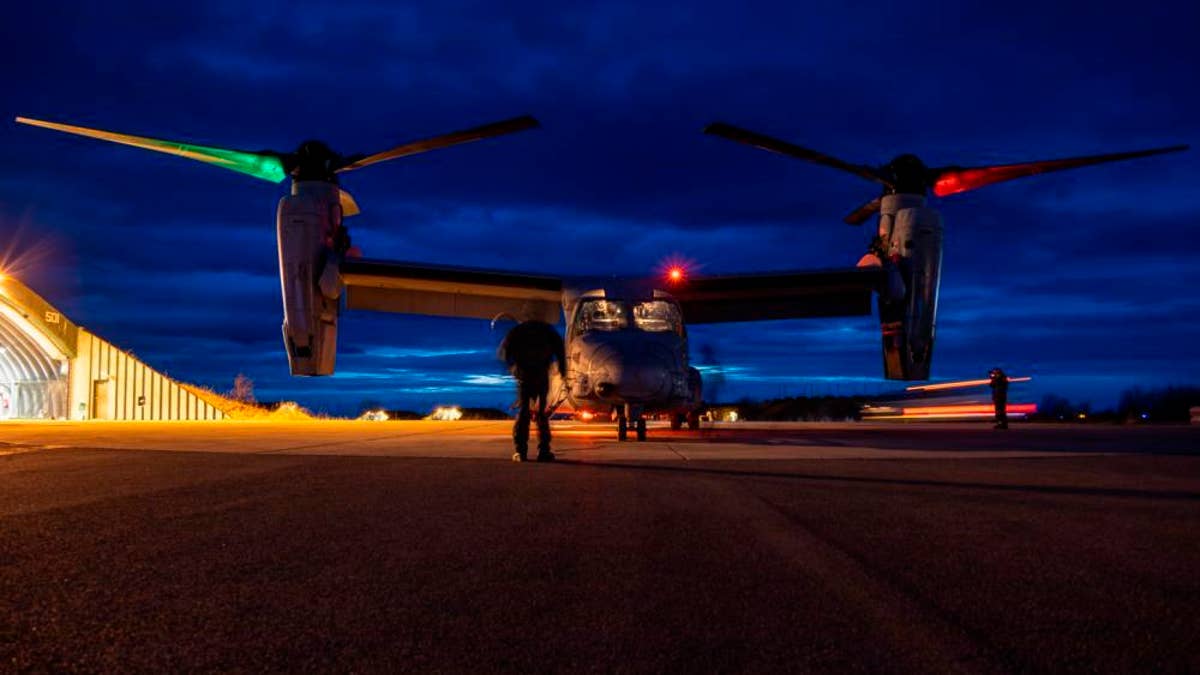 Marines inspect Osprey