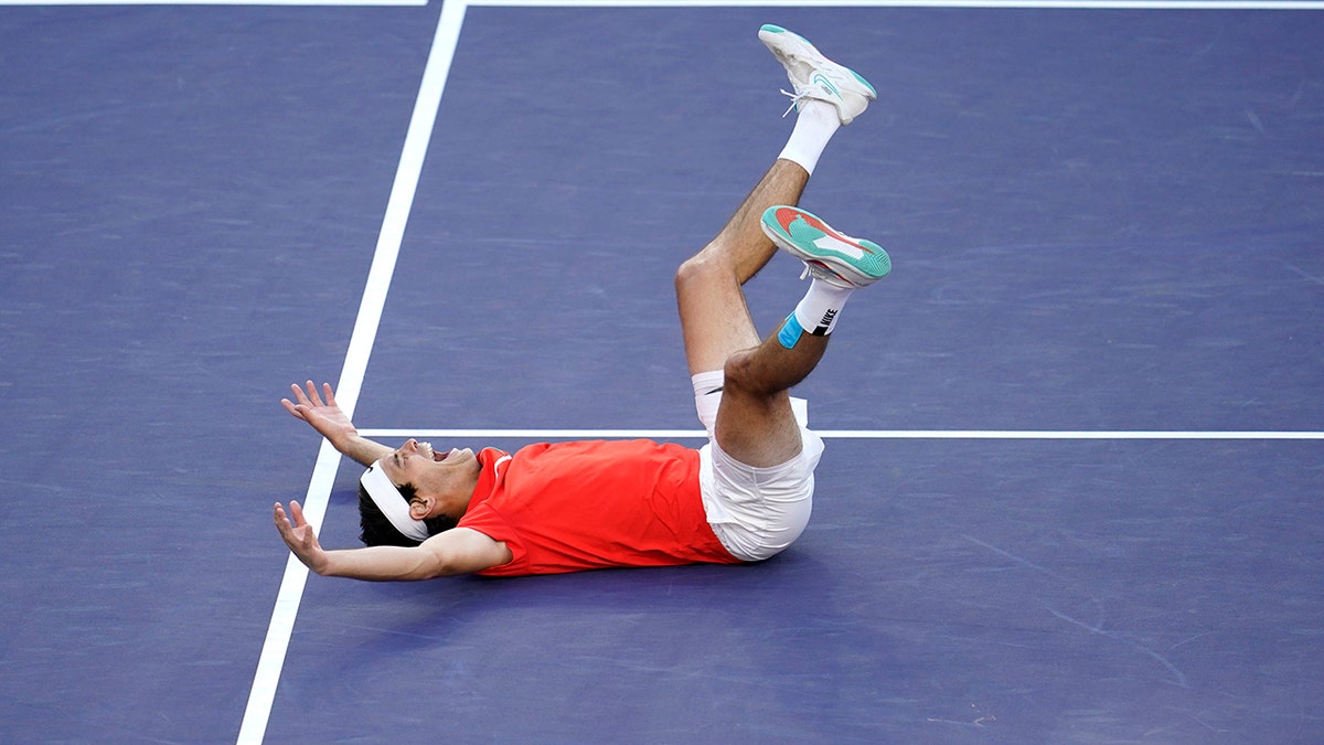 Taylor Fritz reacts after defeating Rafael Nadal, of Spain, during the men's singles finals at the BNP Paribas Open tennis tournament Sunday, March 20, 2022, in Indian Wells, Calif. Fritz won 6-3, 7-6.