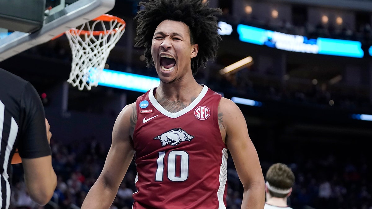 Arkansas forward Jaylin Williams reacts after dunking against Gonzaga during the first half of a college basketball game in the Sweet 16 round of the NCAA tournament in San Francisco, Thursday, March 24, 2022.