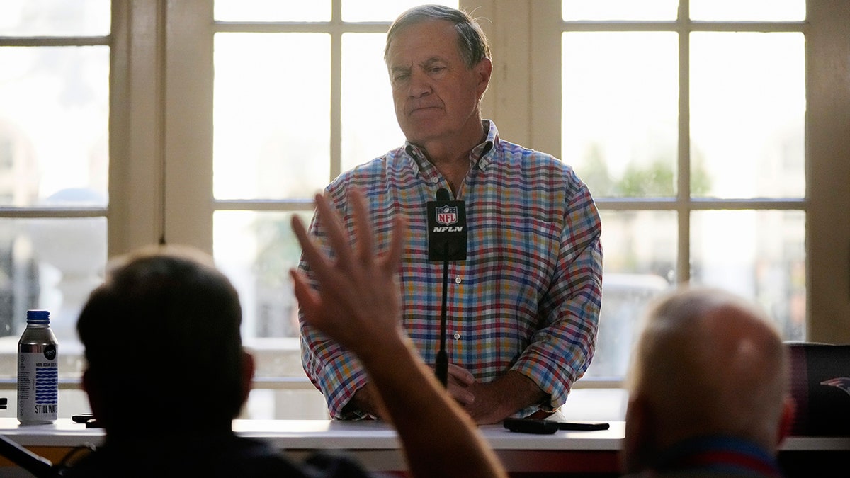 New England Patriots football team head coach Bill Belichick answers questions from journalists at a coaches press availability during the NFL owner's meeting, Monday, March 28, 2022, at The Breakers resort in Palm Beach, Fla.