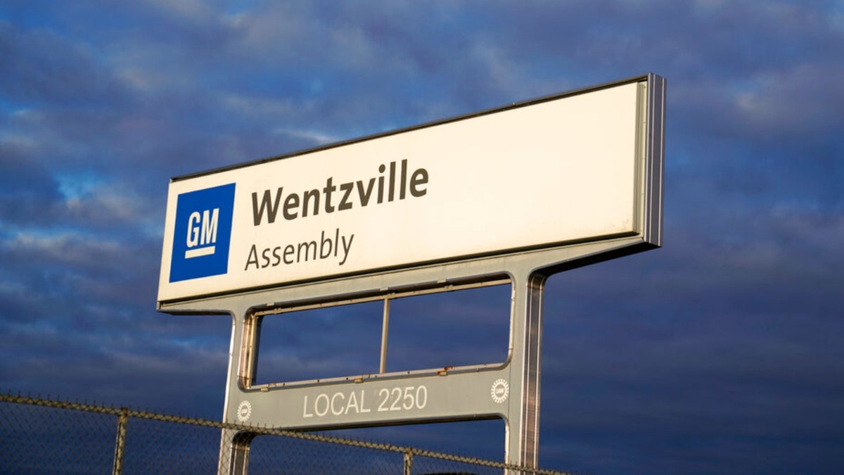 This March 24, 2021, file photo shows a sign near an entrance to a General Motors assembly plant in Wentzville, Mo.