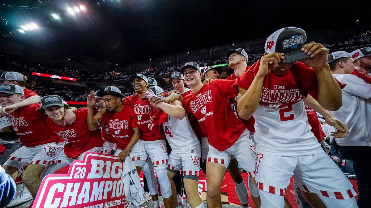 Wisconsin celebrates after defeating Purdue 70-67 in an NCAA college basketball game to clinch a share of the Big Ten regular-season title, Tuesday, March 1, 2022, in Madison, Wis.