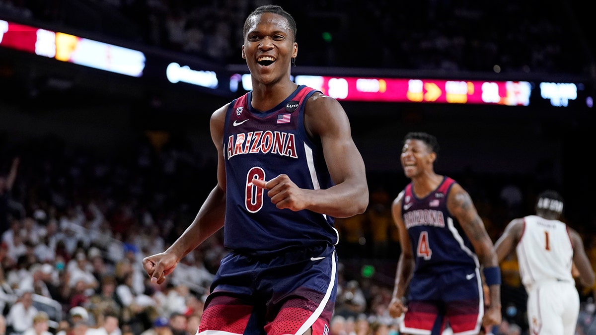 Arizona guard Bennedict Mathurin (0) smiles as his team takes a lead over Southern California during the first half of an NCAA college basketball game Tuesday, March 1, 2022, in Los Angeles. 