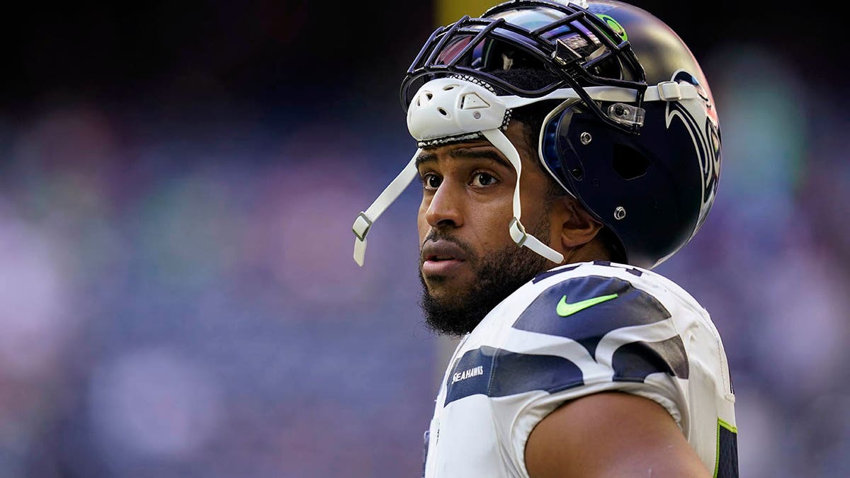 Seattle Seahawks linebacker Bobby Wagner pauses during the team's NFL football game against the Houston Texans on Dec. 12, 2021, in Houston.