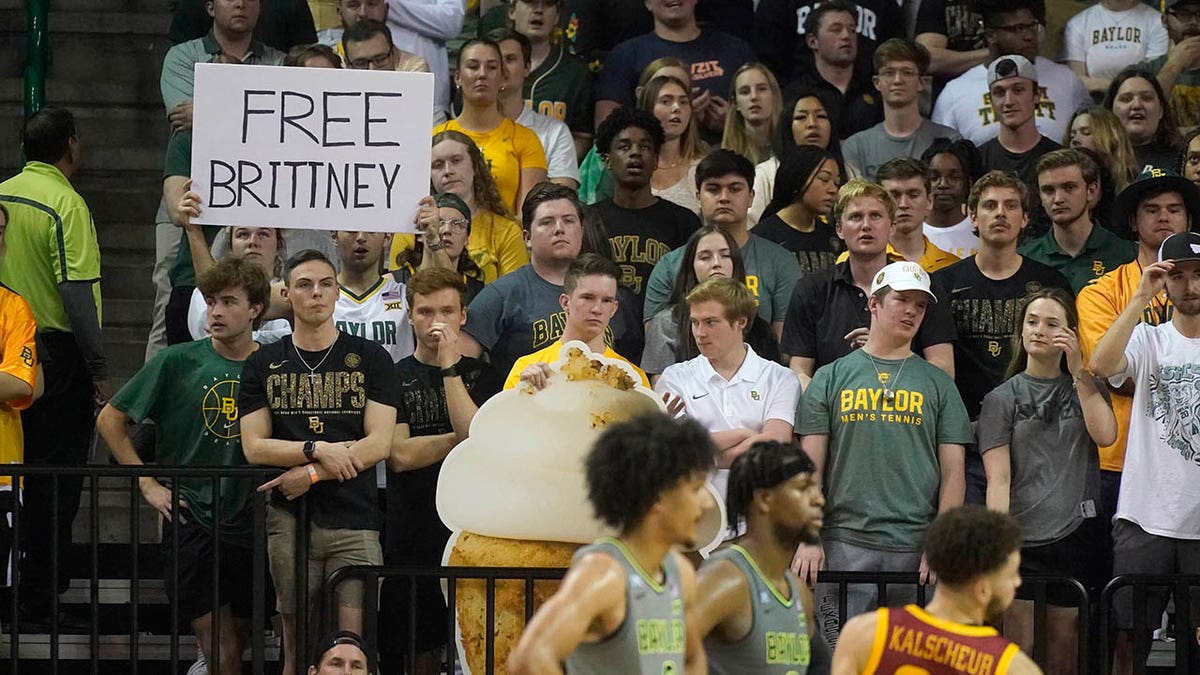 A fan in the stands holds up sign saying "Free Brittney" during the second half of an NCAA college basketball game between Iowa State and Baylor in Waco, Texas, Saturday, March 5, 2022.