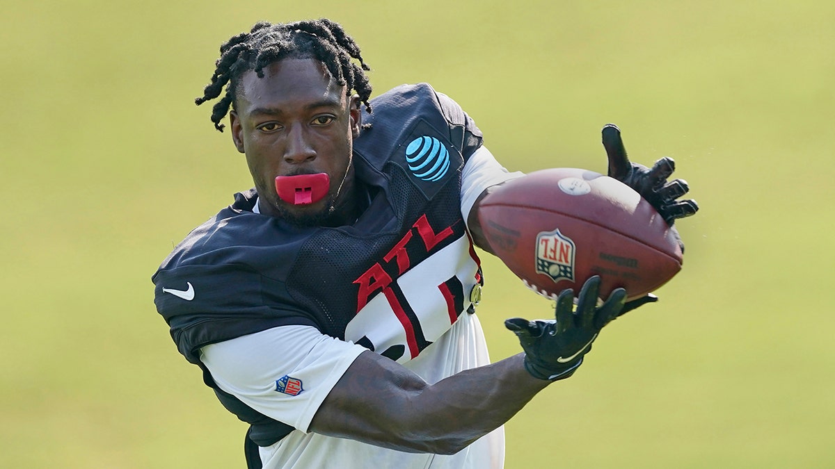 FILE - Atlanta Falcons wide receiver Calvin Ridley (18) makes a catch during the team's NFL training camp football practice Monday, Aug. 9, 2021, in Flowery Branch, Ga. Falcons wide receiver Calvin Ridley has been suspended for the 2022 season for betting on NFL games in the 2021 season.