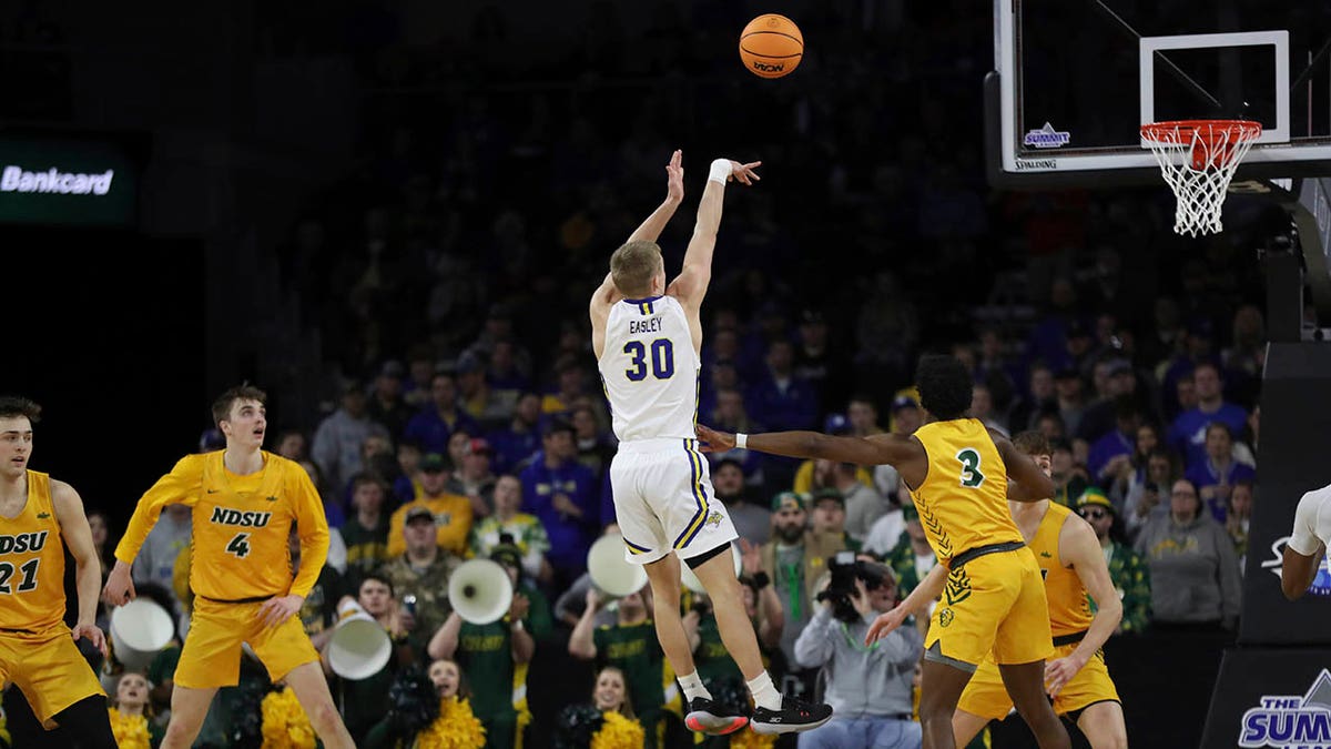 South Dakota State guard Charlie Easley (30) shoots against North Dakota State during the first half of an NCAA college basketball game for the Summit League men's tournament championship Tuesday, March 8, 2022, in Sioux Falls, S.D.