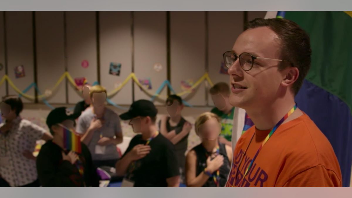 Chasten leads an LGBTQ youth group in a "pledge" of allegiance to the rainbow pride flag ahead of the 2020 presidential primary in Iowa as depicted in the Amazon Prime documentary "Mayor Pete."