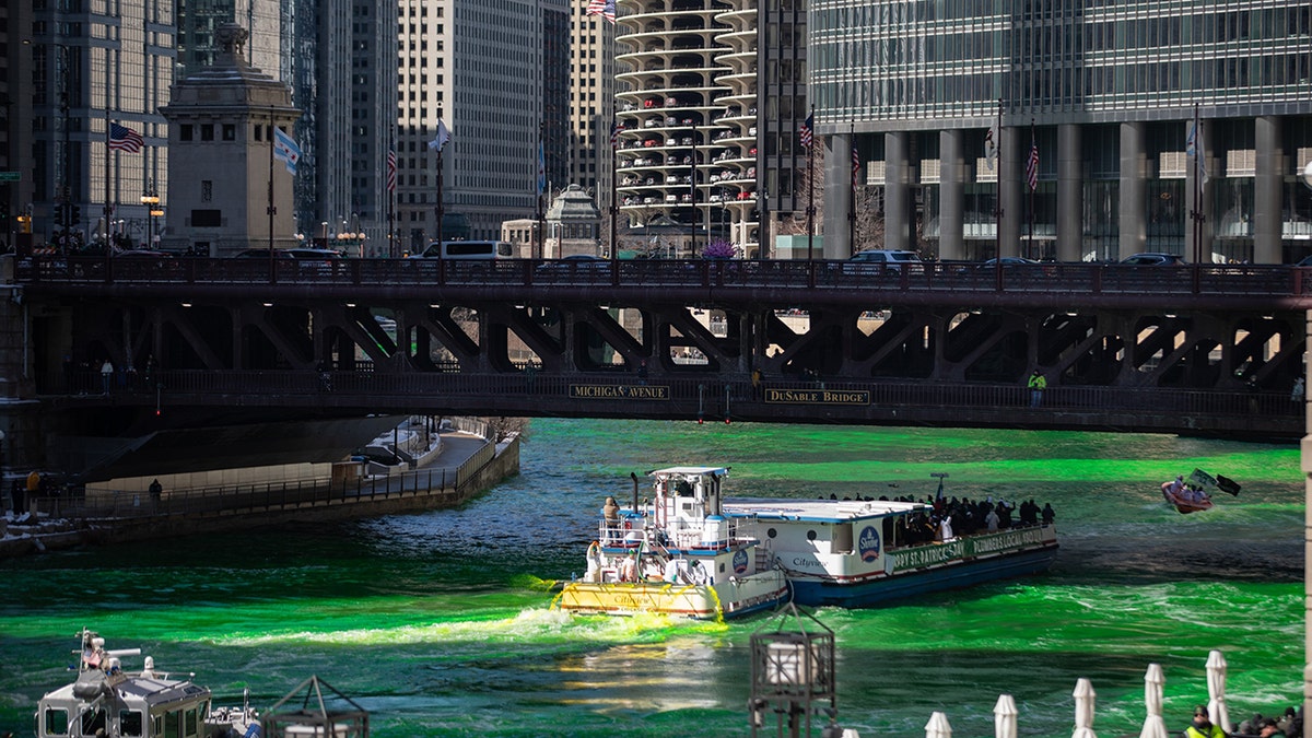Crowds watched while the Chicago Plumbers Union Local 130 dyed the Chicago River green ahead of St. Patrick's Day.