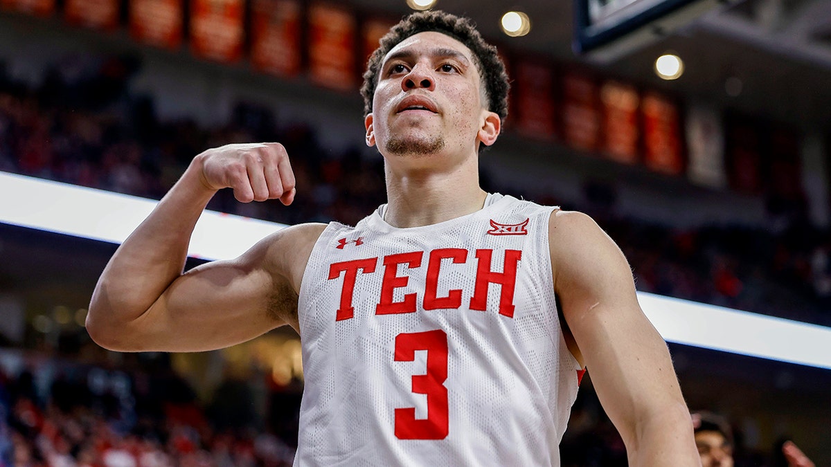 Texas Tech's Clarence Nadolny (3) celebrates after a foul call during the second half of an NCAA college basketball game against Kansas State on Monday, Feb. 28, 2022, in Lubbock, Texas.