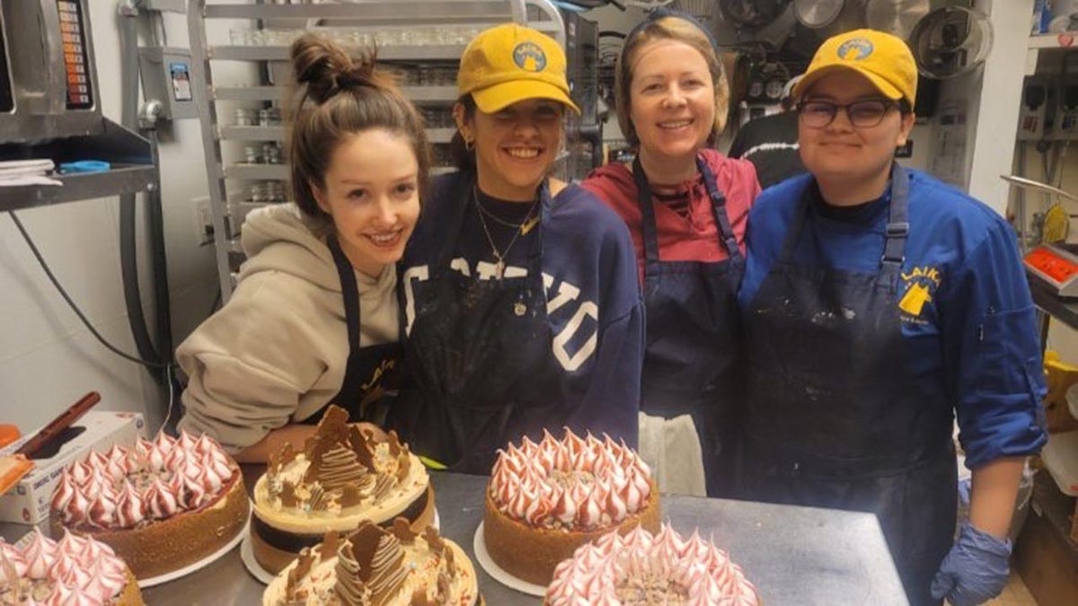 Anna Afanasieva and Laika Cheesecakes and Espresso employees