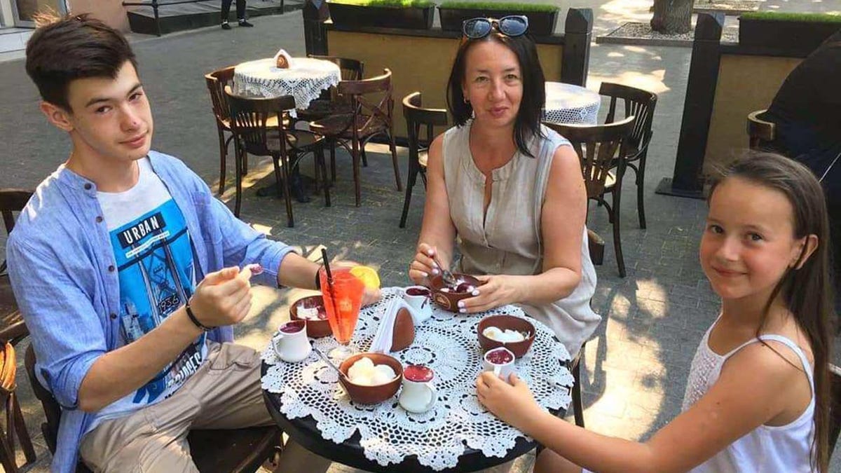 Ivan Kozlov, his mom and sister