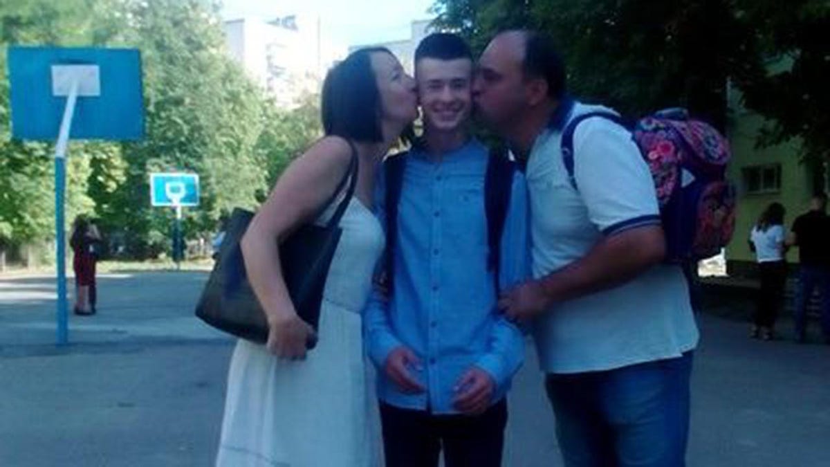 Ivan Kozlov and his parents