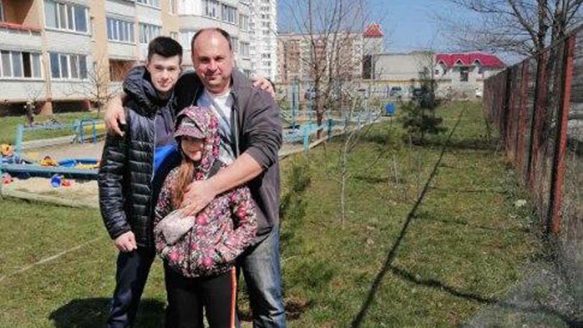 Ivan Kozlov, his sister and his dad