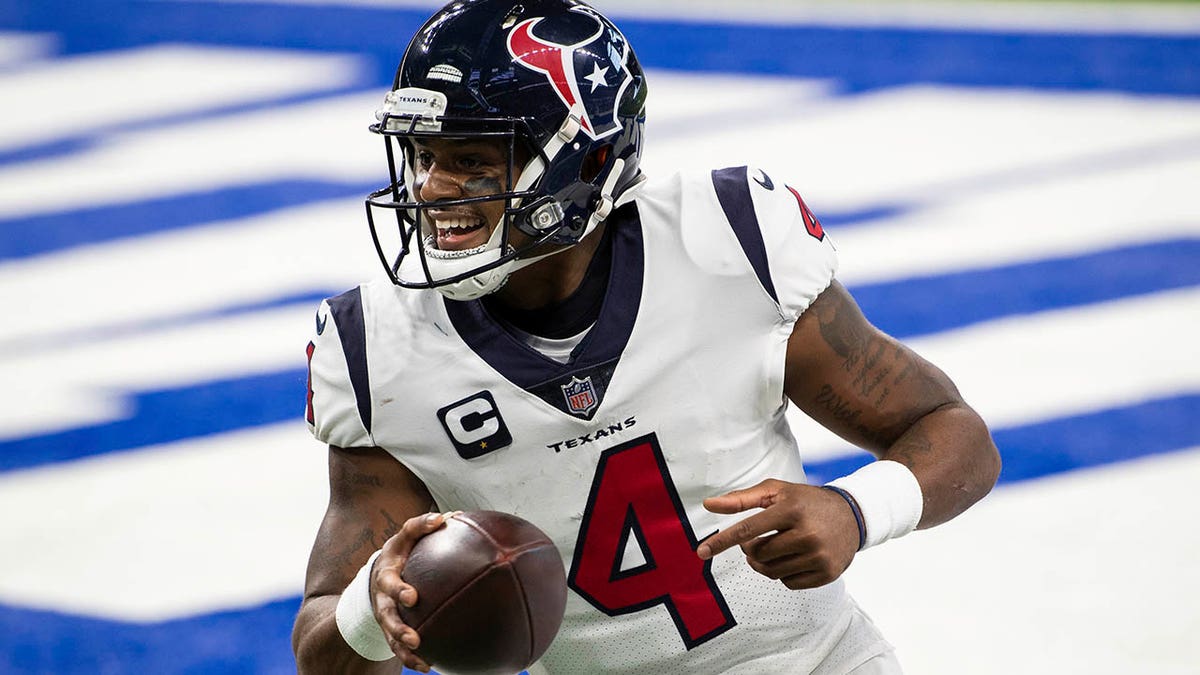 Houston Texans quarterback Deshaun Watson (4) celebrates a touchdown during the team's NFL football game against the Indianapolis Colts on Dec. 20, 2020, in Indianapolis.