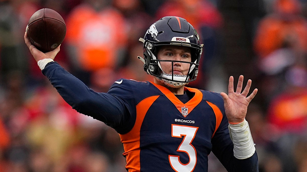 FILE - Denver Broncos quarterback Drew Lock (3) passes against the Kansas City Chiefs during the first half of an NFL football game Jan. 8, 2022, in Denver. Lock says he is relishing the chance to get a fresh start for his career following his trade to the Seattle Seahawks.