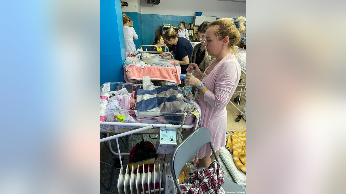 A mother in a makeshift NICU in the Saltivka region of Kharkiv, Ukraine (UNICEF)