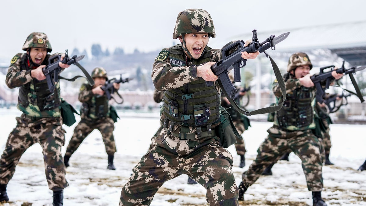 Officers and soldiers conduct training in Southwest Guizhou, Guizhou Province, China, Feb. 22, 2022. (Costfoto/Future Publishing via Getty Images)