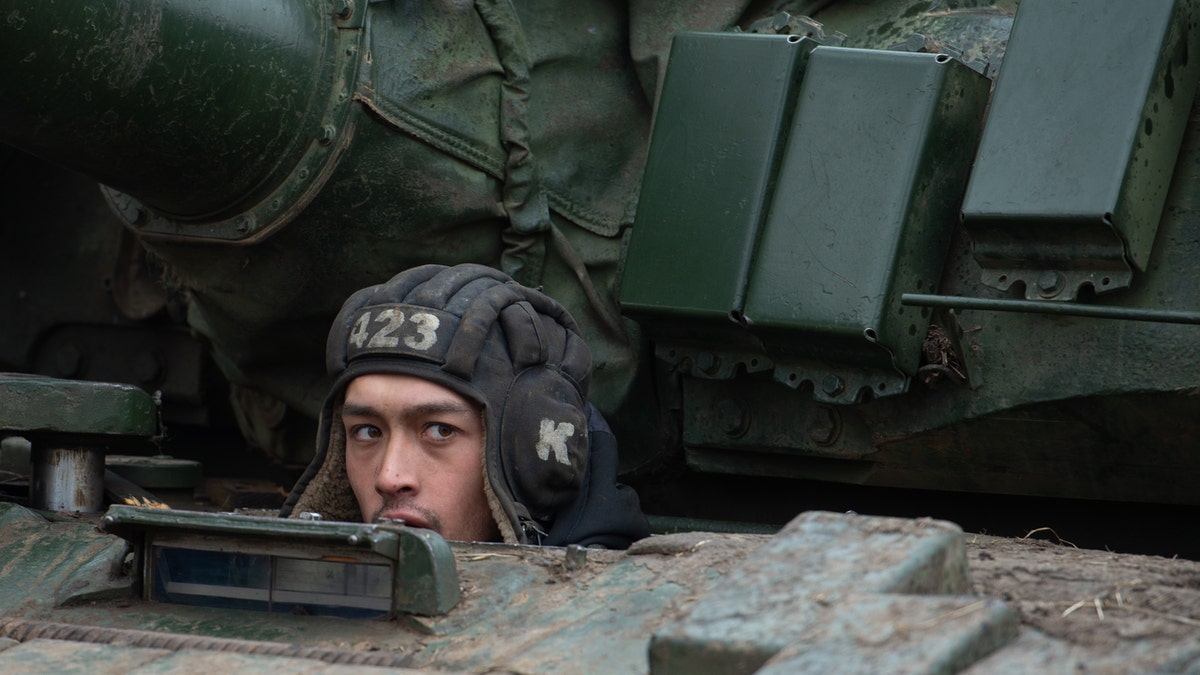 DONETSK, UKRAINE - MARCH 01: Pro-Russian separatists, in uniforms without insignia, gather in the separatist-controlled settlement of Mykolaivka (Nikolaevka) and Bugas, in Donetsk region (DPR) of Ukraine on March 01, 2022. (Photo by Stringer/Anadolu Agency via Getty Images)