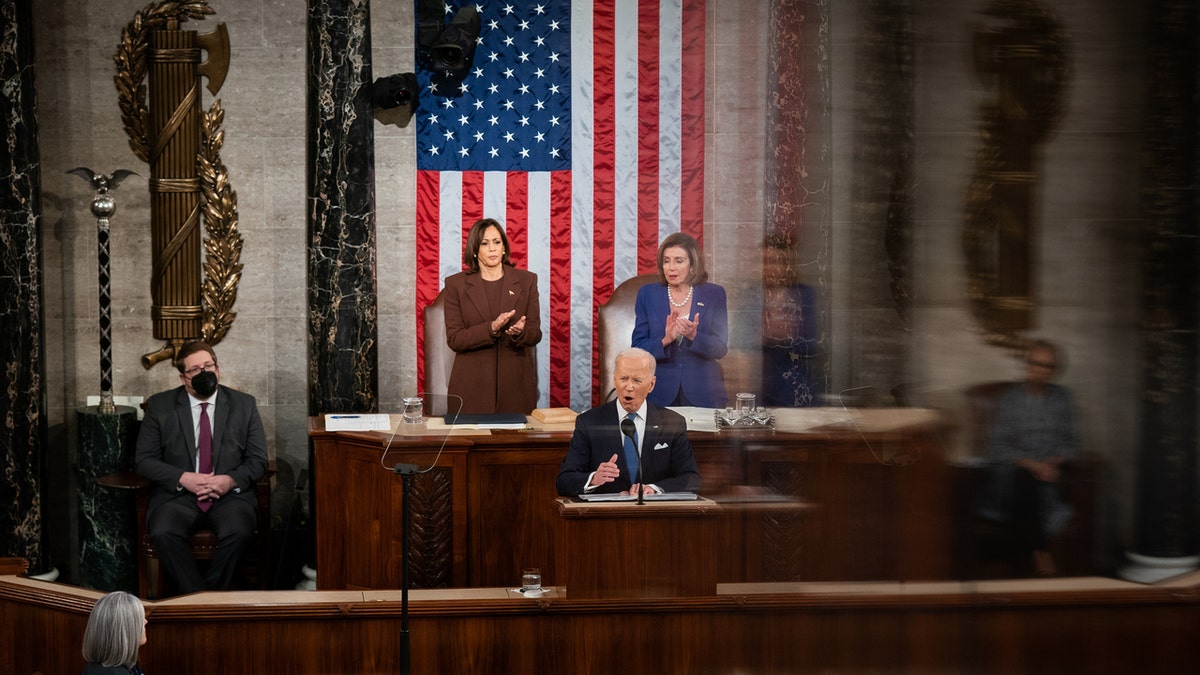 President Biden stands in front of Congress during State of the Union speech in 2022