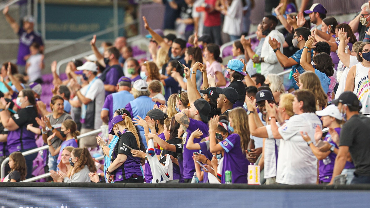 Fans celebrate the Orlando Pride win after the home game at Exploria Stadium against Kansas City on May 30, 2021, in Orlando, Florida.
