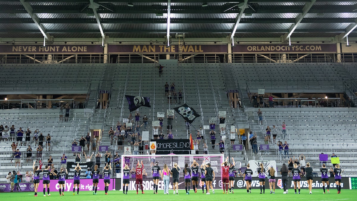 Orlando Pride thanks the supporters during a game between NJ/NY Gotham City FC and Orlando Pride at Exploria Stadium on October 9, 2021 in Orlando, Florida.