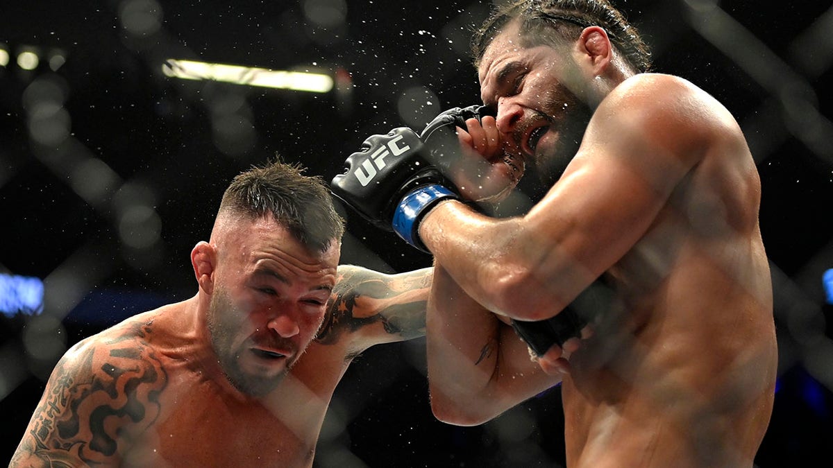 Colby Covington (L) and Jorge Masvidal battle in their welterweight fight during UFC 272 at T-Mobile Arena on March 05, 2022, in Las Vegas, Nevada.