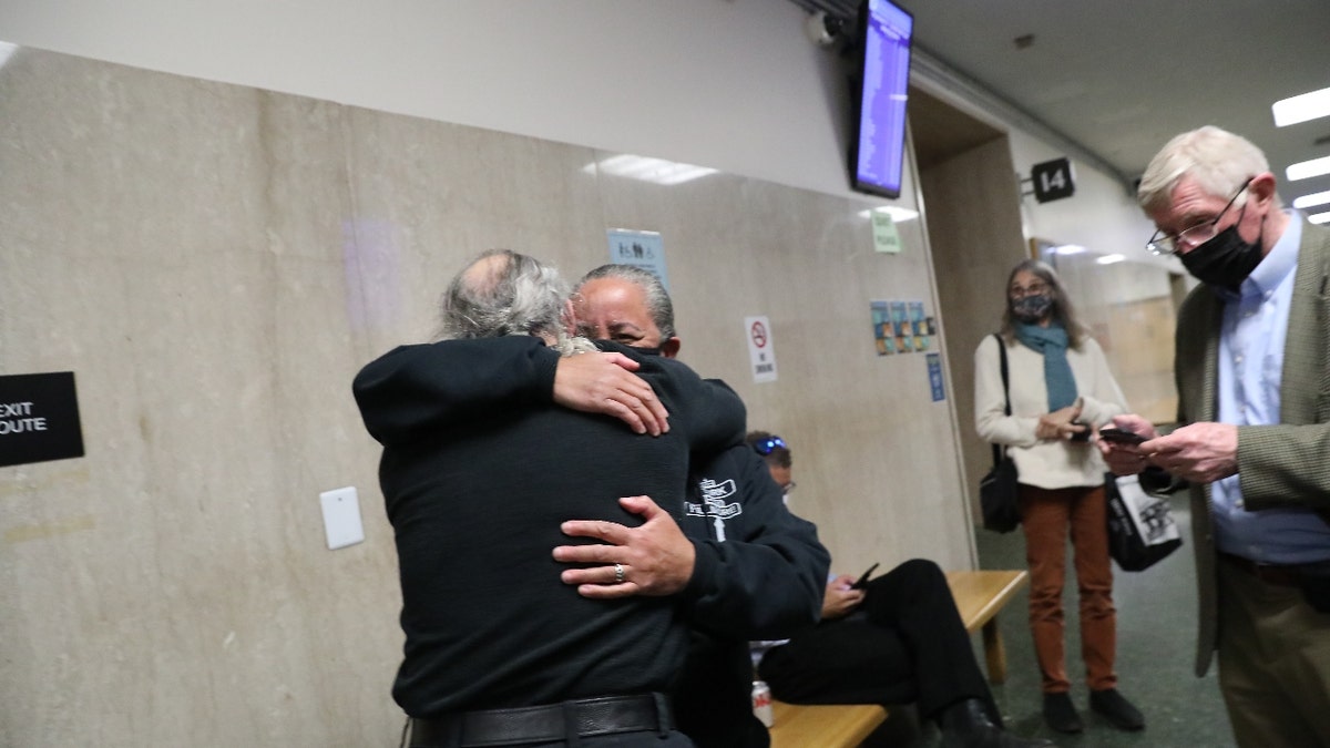 San Francisco Police Officers Association Acting President Tracy McCray (right) and Kevin Martin (left) retired San Francisco police officer and assistant legal administrator for San Francisco Police Officers Association embrace after the verdict in the trial of SFPD officer Terrance Stangel at the Hall of Justice on Monday, March 7, 2022 in San Francisco, Calif. (Lea Suzuki/San Francisco Chronicle via Getty Images)