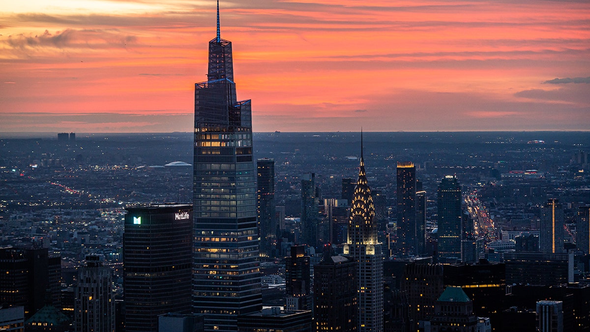 NEW YORK, NEW YORK - MARCH 20: A view of One Vanderbilt during a sunrise as seen from the Edge observation deck at Hudson Yards on the first day of spring on March 20, 2022 in New York City.