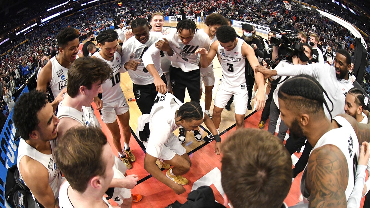 March Madness Providence Friars Ed Croswell celebrate