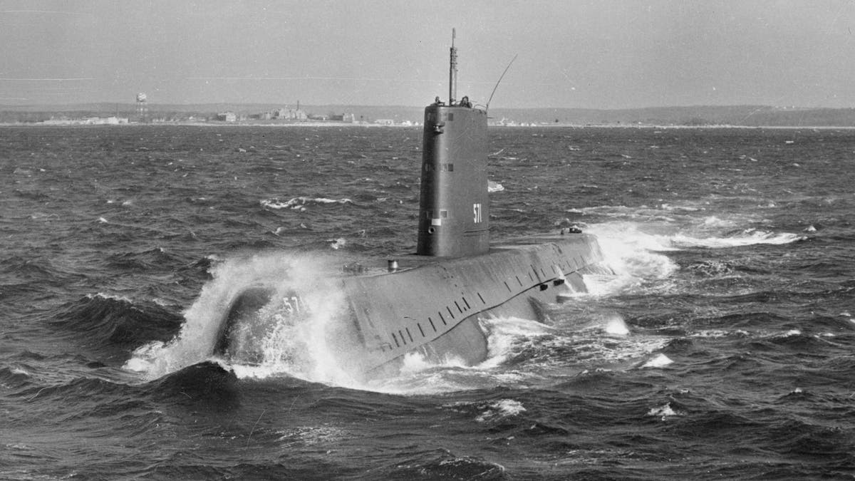 The world's first nuclear-powered submarine Nautilus sets out to sea on a trial run.