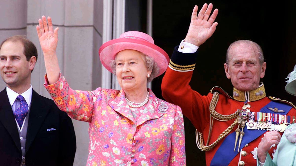 Queen Elizabeth II and Prince Philip were accompanied by their son, Prince Edward, during Trooping of the Colour ceremony at Buckingham Palace in June 2000.