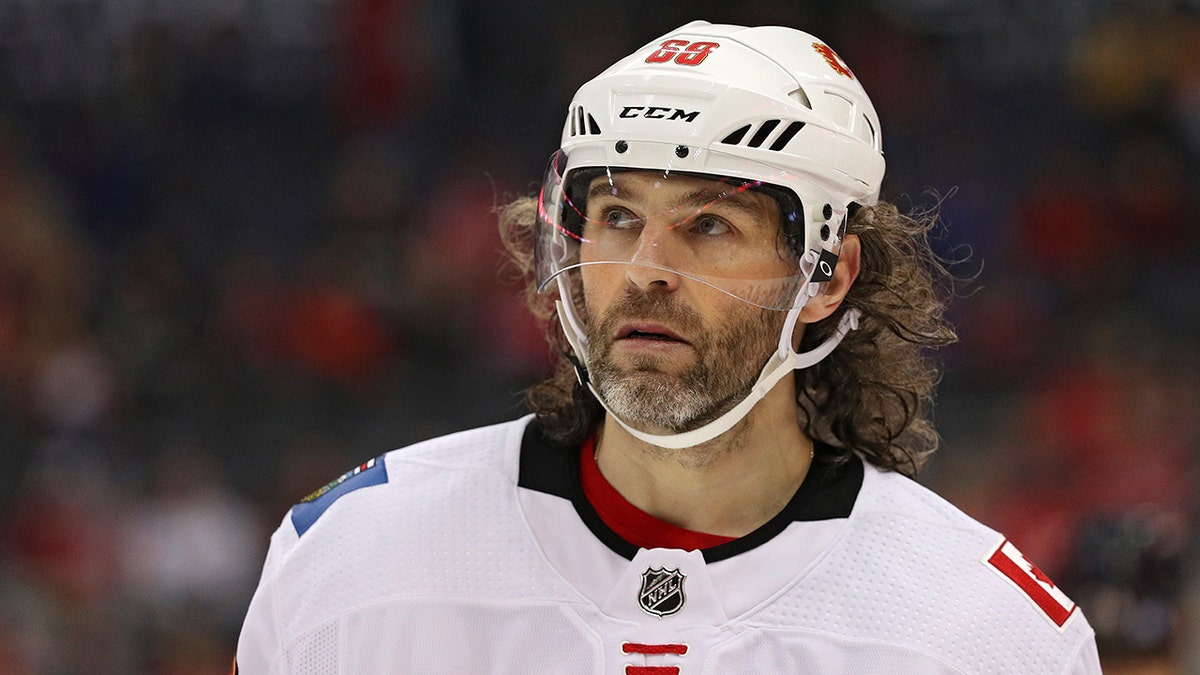 Jaromir Jagr looks on during an NHL game