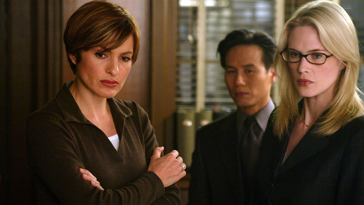 Stephanie March (right) as A.D.A. Alexandra Cabot, Mariska Hargitay as Detective Olivia Benson and B.D. Wong as Doctor George Huang in 