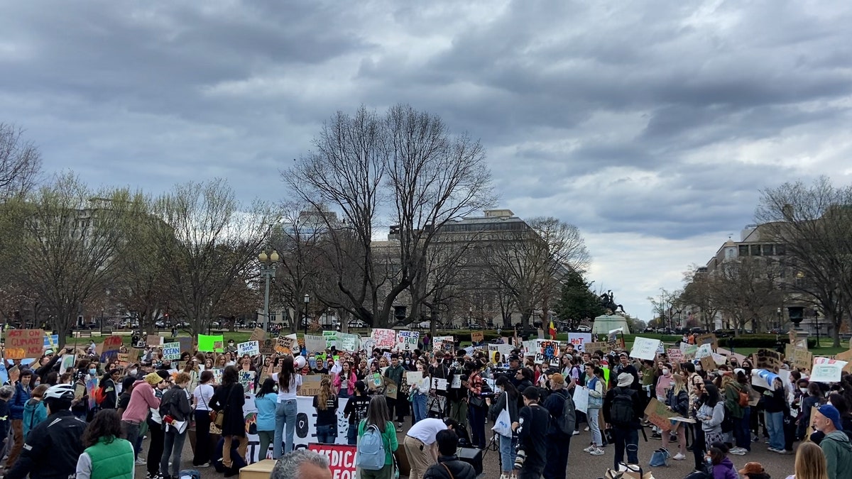 Climate activists gathered outside the White House Friday afternoon