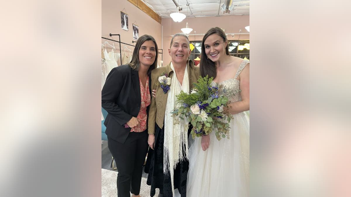 Krista Larrison (left) met Colleen Gilbert (middle) and Christine Gilbert (right) in person when the pair stopped by Kita Events Northwest Bridal &amp; Formal Wear for a wedding dress try-on party.