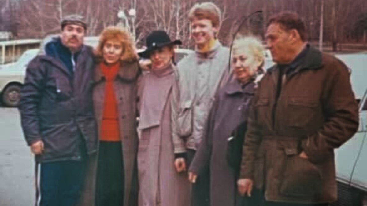 Stella Binkenvich's mother and father (right), grandmother and grandfather (right) saying goodbye to relatives (center) on the day they left Donestk