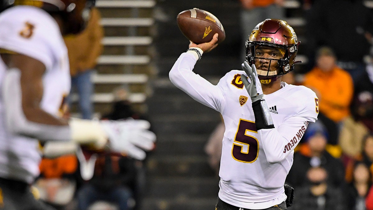 FILE - Arizona State quarterback Jayden Daniels (5) passes to running back Rachaad White (3) during the first quarter of an NCAA college football game Nov. 20, 2021, in Corvallis, Ore. Former Arizona State quarterback Daniels is transferring to LSU, where he will enter a wide open competition to be the starter in coach Brian Kelly’s first season with the Tigers.