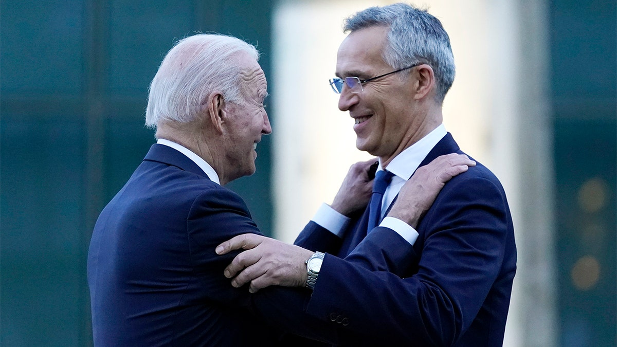 FILE - U.S. President Biden and NATO Secretary General Jens Stoltenberg speak while visiting a memorial to the September 11 terrorist attacks at NATO headquarters in Brussels, June 14, 2021. (AP Photo/Patrick Semansky, File)