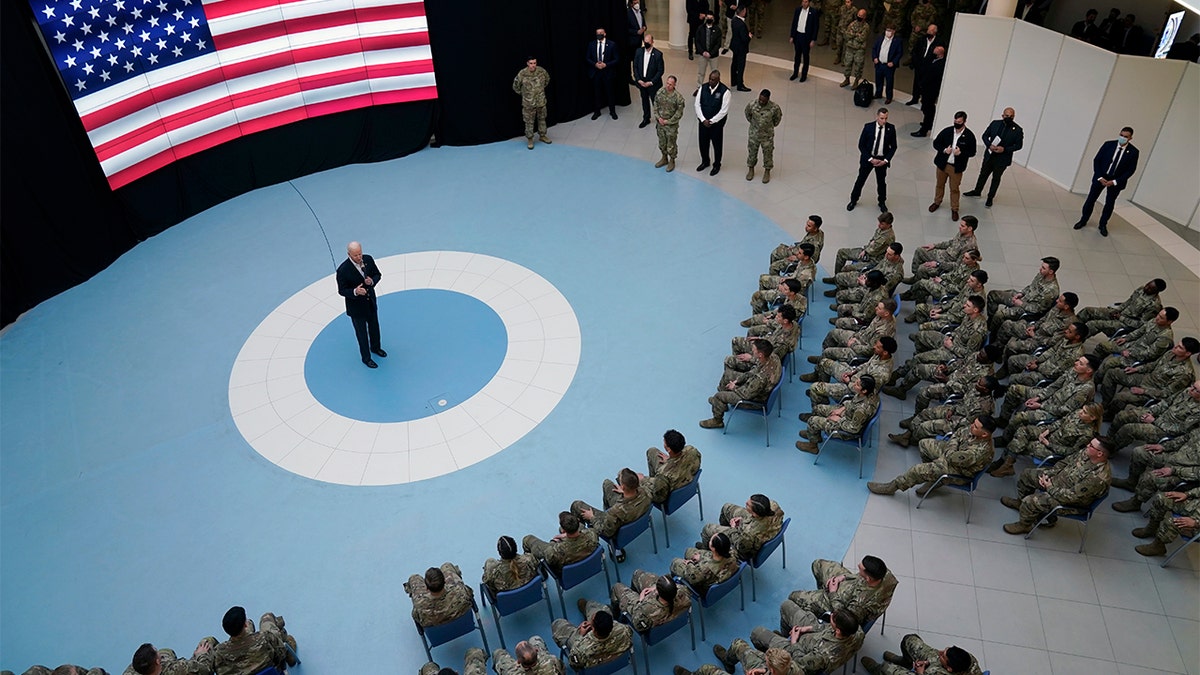 President Biden speaks to members of the 82nd Airborne Division at the G2A Arena, Friday, March 25, 2022, in Jasionka, Poland. (AP Photo/Evan Vucci)