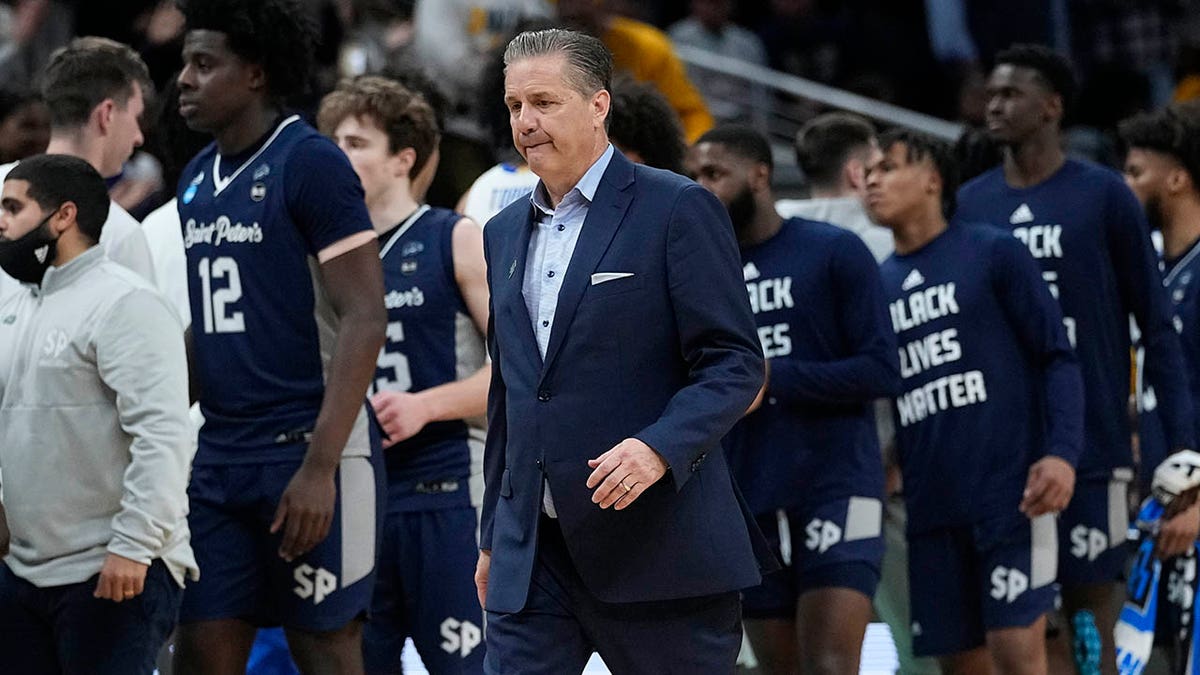 Kentucky head coach John Calipari walks off the court at the end of a college basketball game against Saint Peter's in the first round of the NCAA tournament, Thursday, March 17, 2022, in Indianapolis. Saint Peter's won 85-79 in overtime.