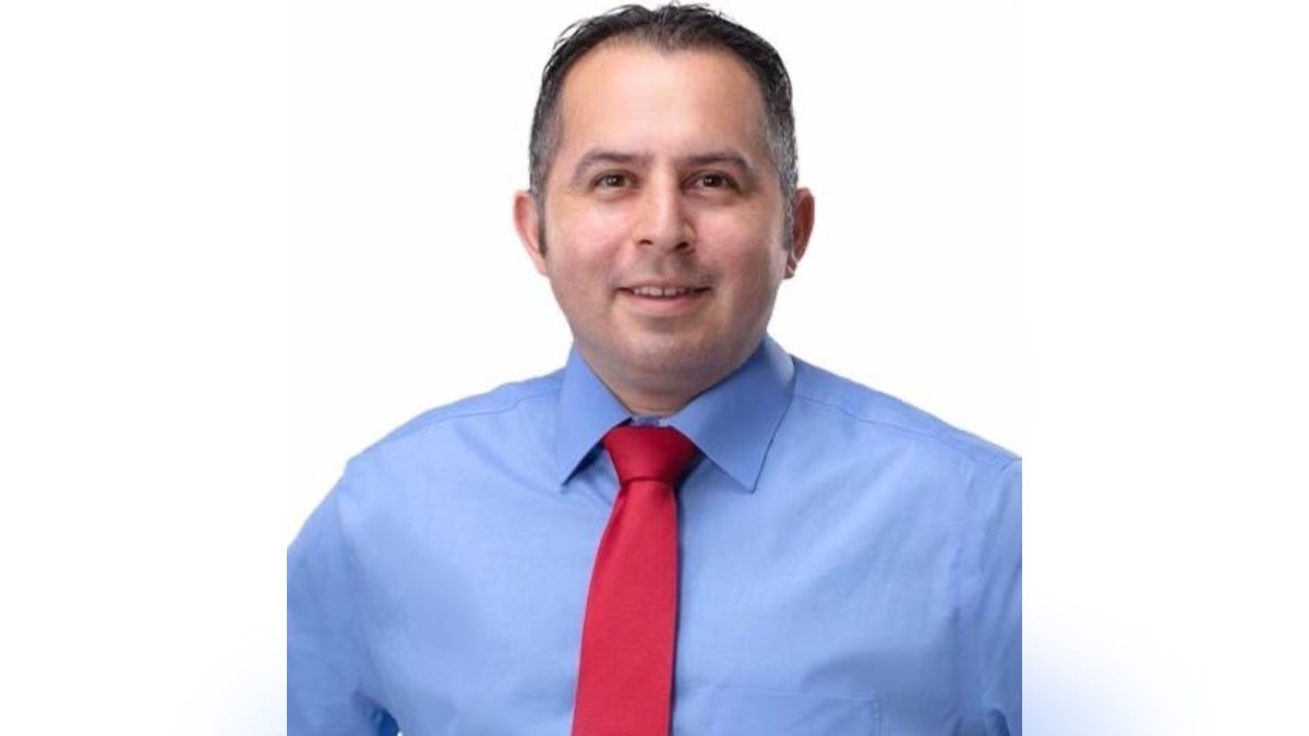 Jose Castillo, Hispanic candidate in a blue shirt with a red tie