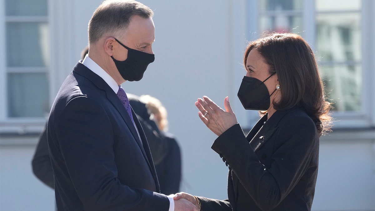 U.S. Vice President Kamala Harris is greeted by Polish President Andrzej Duda during their meeting in Warsaw, Thursday, March 10, 2022. (AP Photo/Czarek Sokolowski)