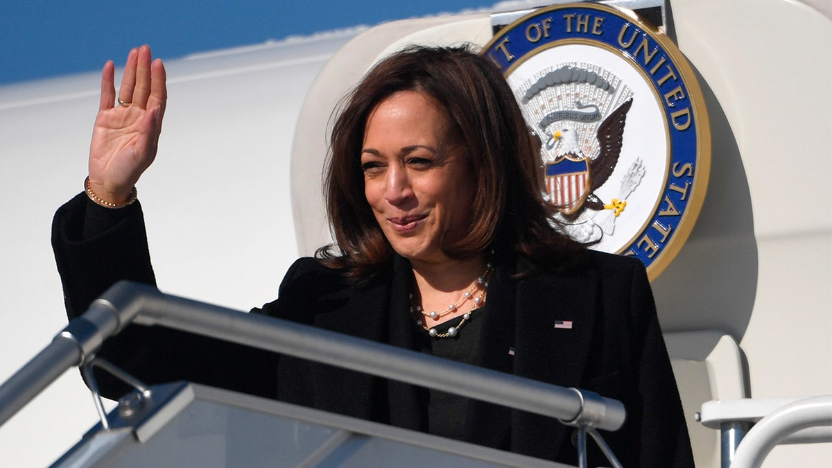 Vice President Kamala Harris waves as she boards the Air Force Two prior to departing for Romania, at Warsaw Chopin International Airport, in Warsaw, Poland, Friday, March 11, 2022. (Saul Loeb/Pool Photo via AP)