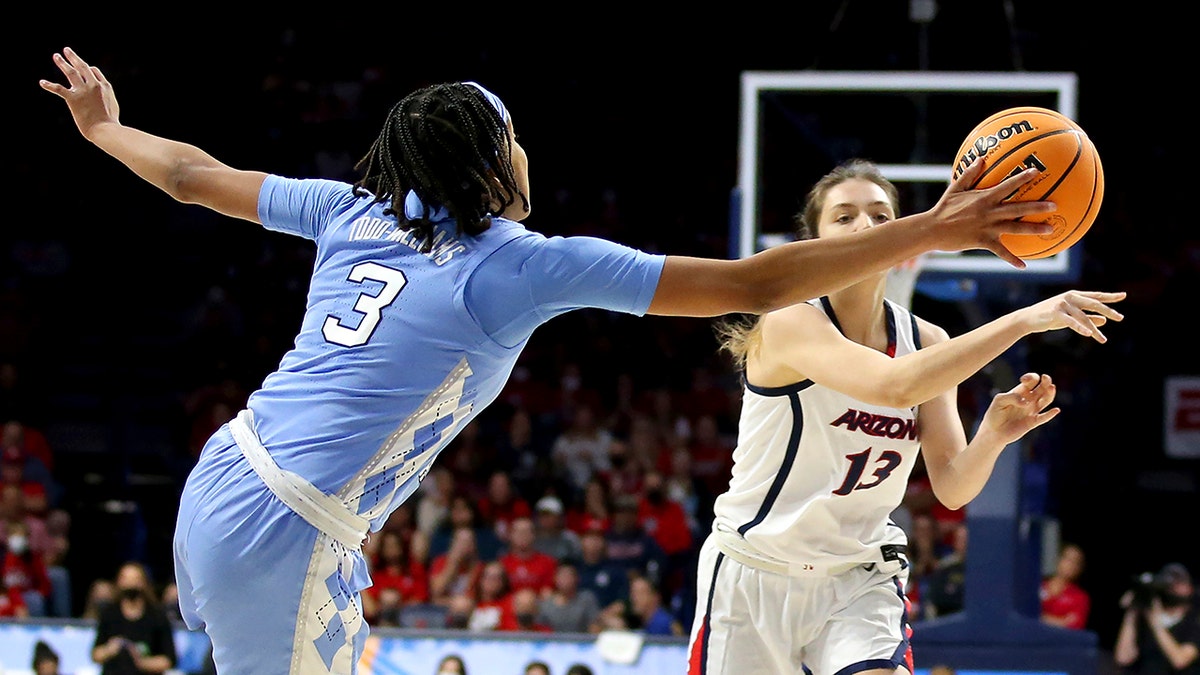 North Carolina guard Kennedy Todd-Williams (3) gets her hand on a pass from Arizona guard Helena Pueyo (13) during a women's college basketball game in the NCAA tournament hosted in Tucson, Ariz., Monday, March 21, 2022.