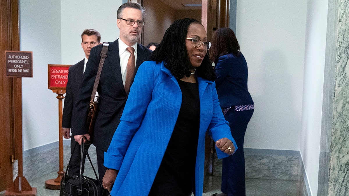 Supreme Court nominee Ketanji Brown Jackson arrives for the third day of her confirmation hearing before the Senate Judiciary Committee on Capitol Hill, in Washington, Wednesday, March 23, 2022. (AP Photo/Jose Luis Magana)