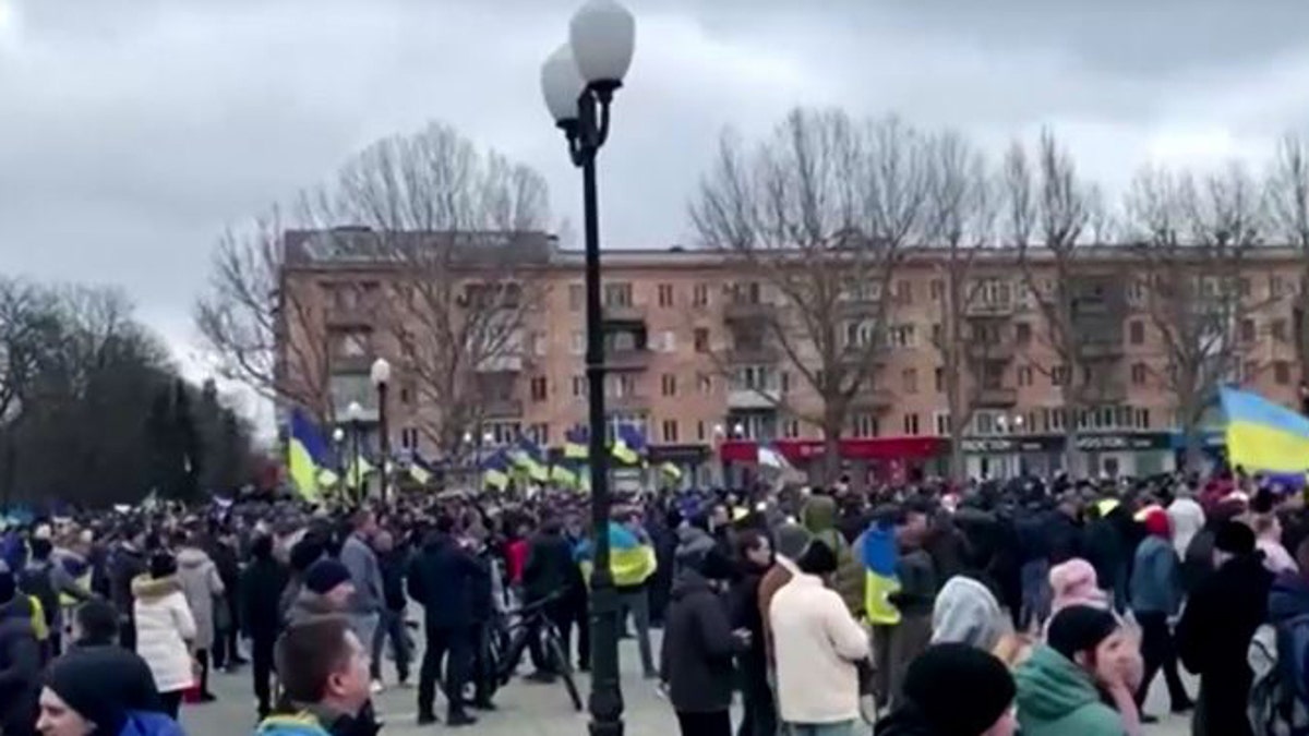 Ukrainians protest against Russian forces after they seized Kherson.