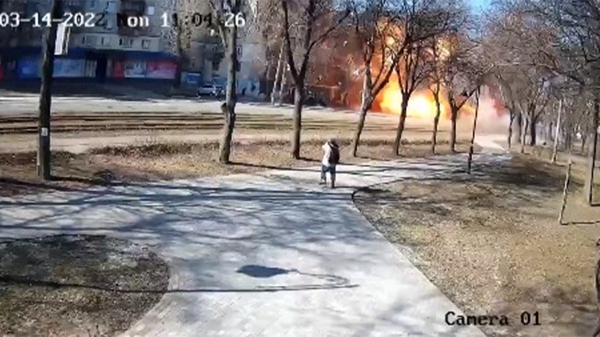 Surveillance video from a park in Kyiv shows the moment a Russian rocket landed on a civilian bus, according to city officials.
